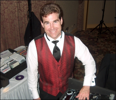 DJ Neil tests his equipment before the start of this party. DJ Neil tests his equipment before the start of this party.