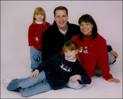 Bob and his wife, Danielle, with their daughters Stephanie and&nbsp;Victoria.